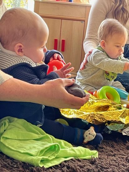 Two babies playing